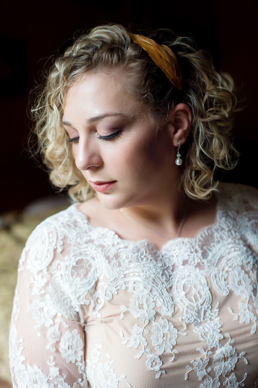 a bride in a pretty white lace top