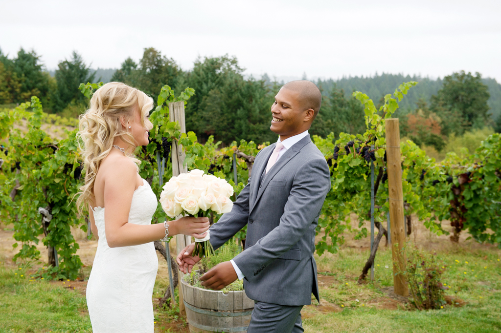 groom sees his bride for the first time on the wedding day at beckenridge vineyard