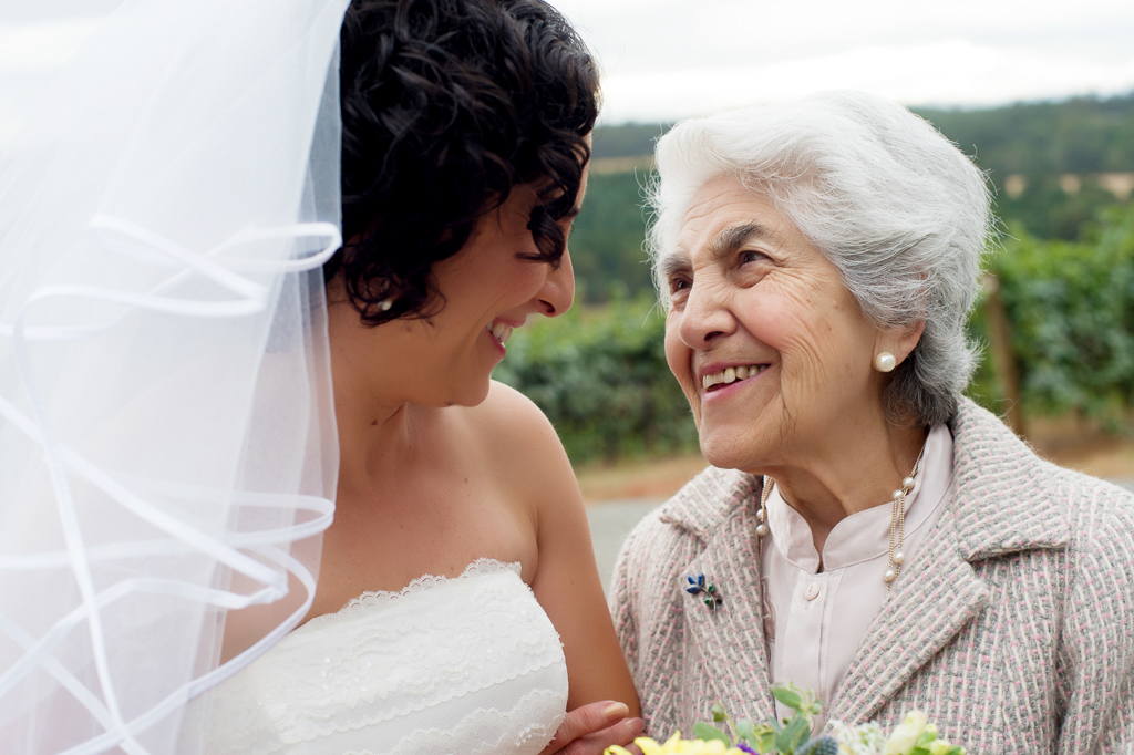 a grandmother gives a bride a loving look