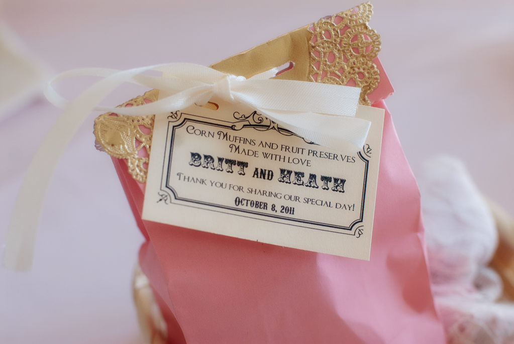 a pretty pink and gold gift bag wedding favor