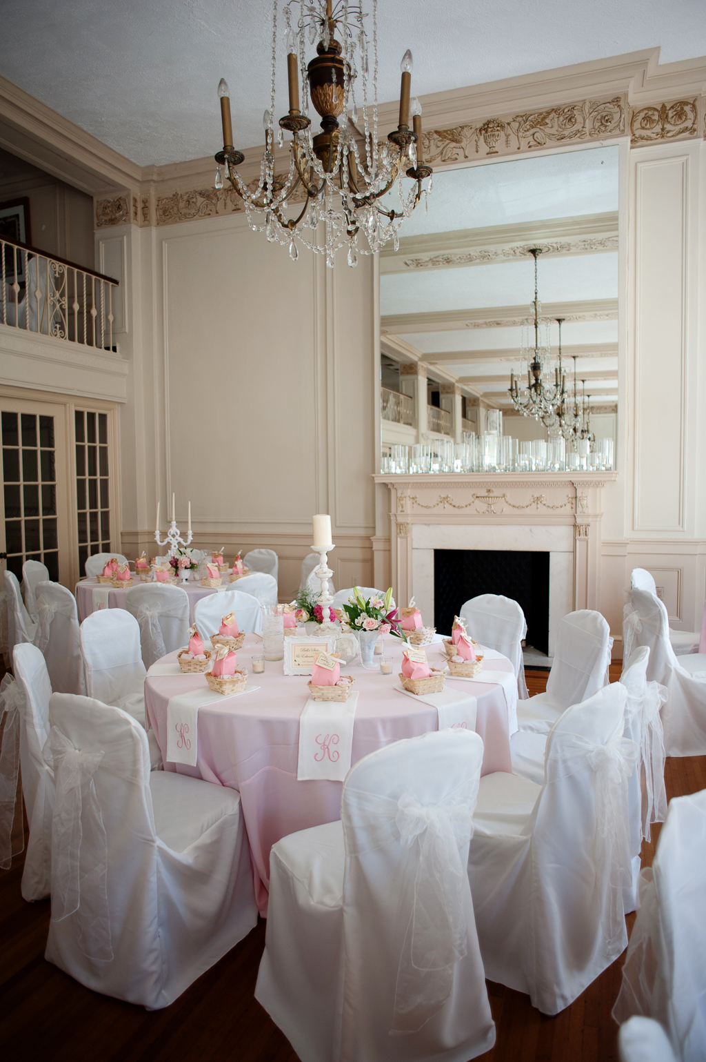 Pretty embroidered monogrammed pink and white napkins for each wedding guest at hotel concord
