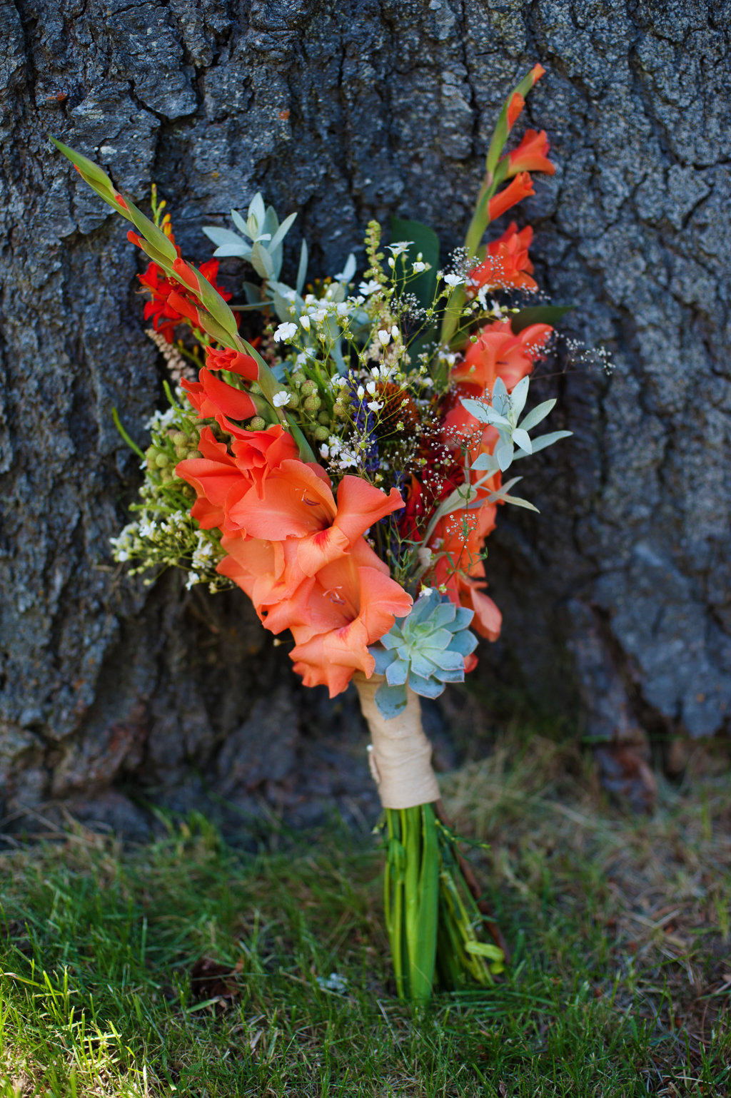 a vibrant orange and green wedding bouquet