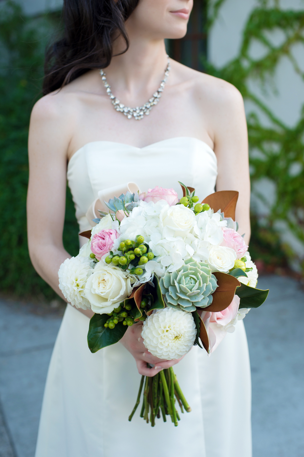a white pink and succulent wedding bouquet