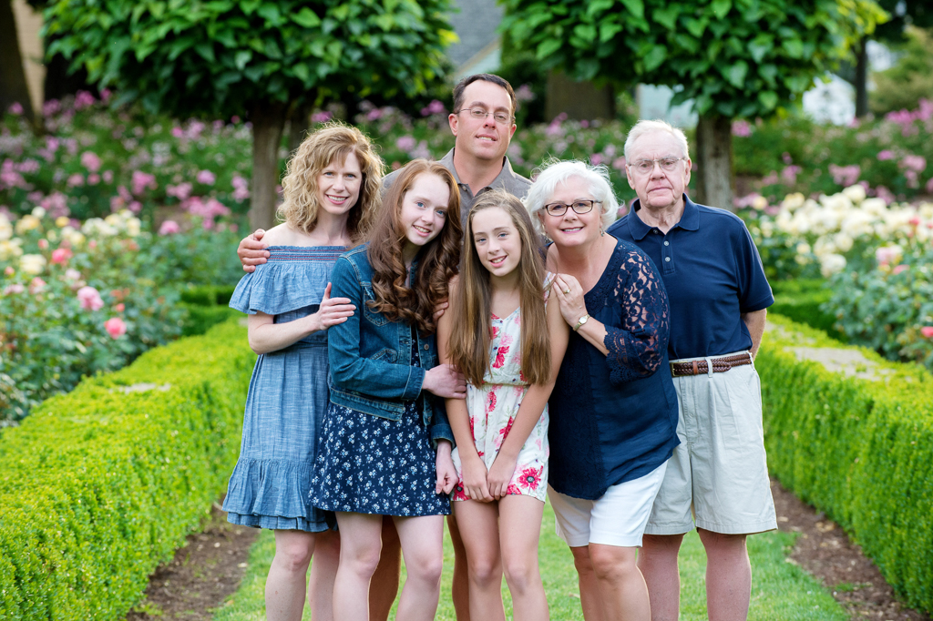 3 generations pose at peninsula park rose garden