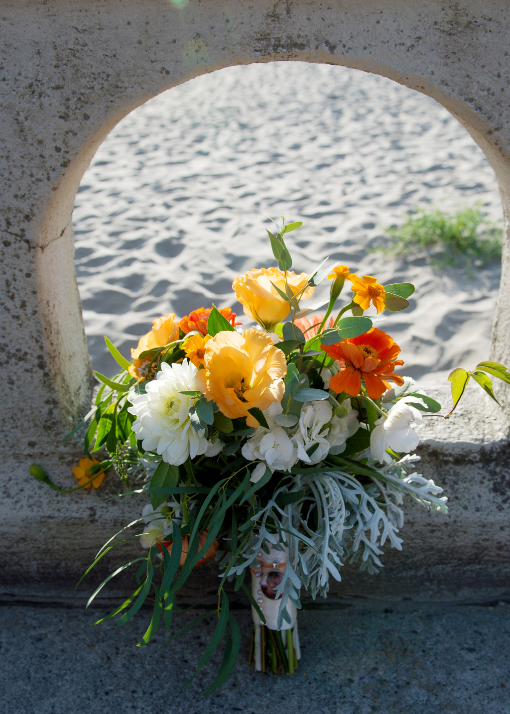 an orange and yellow bouquet