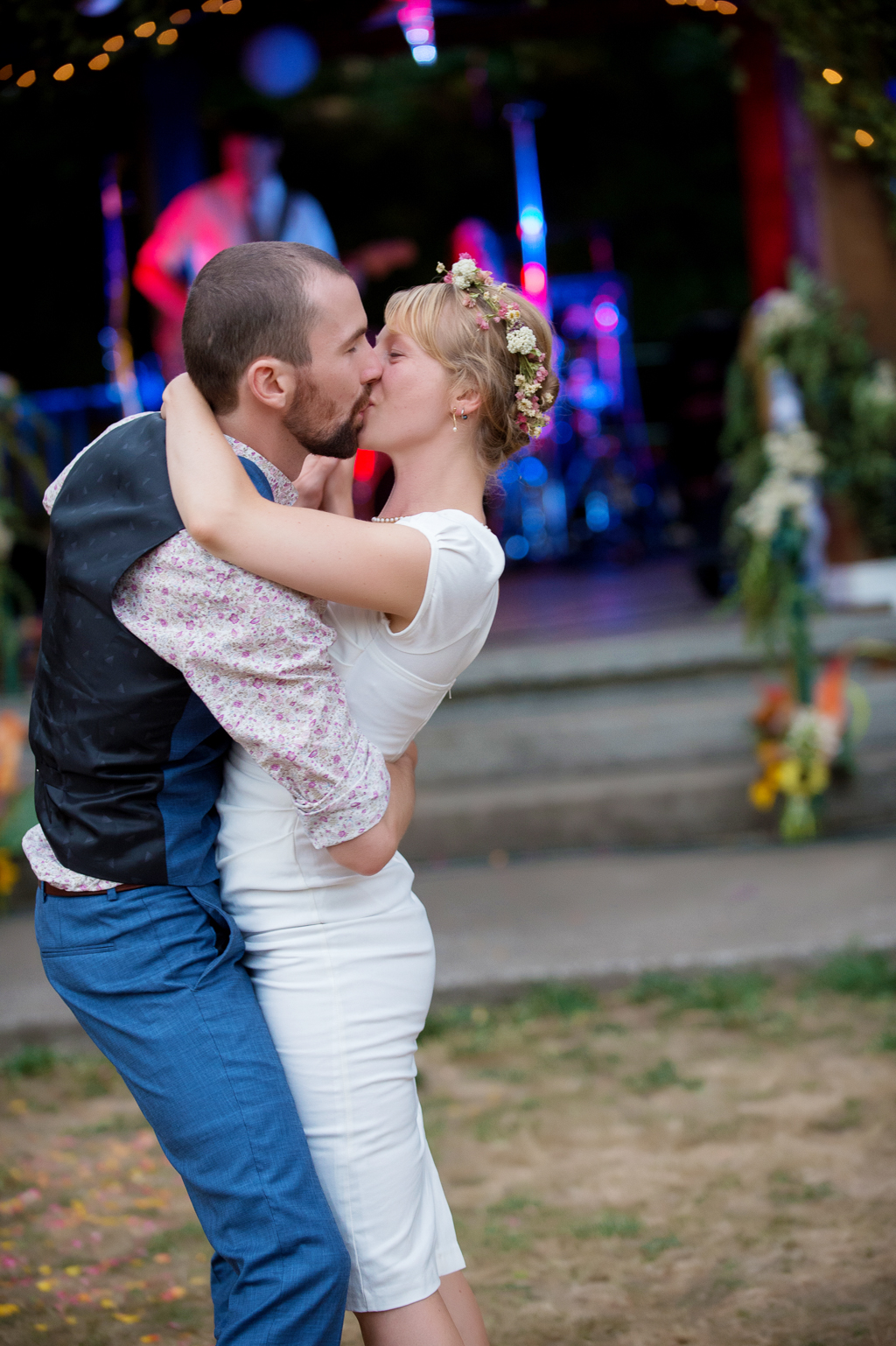 a bride and groom dance in hawkins park