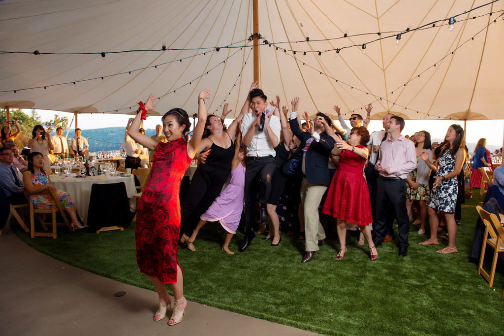 bride in a red wedding dress tosses a pusheen instead of a bouquet and the guests go wild