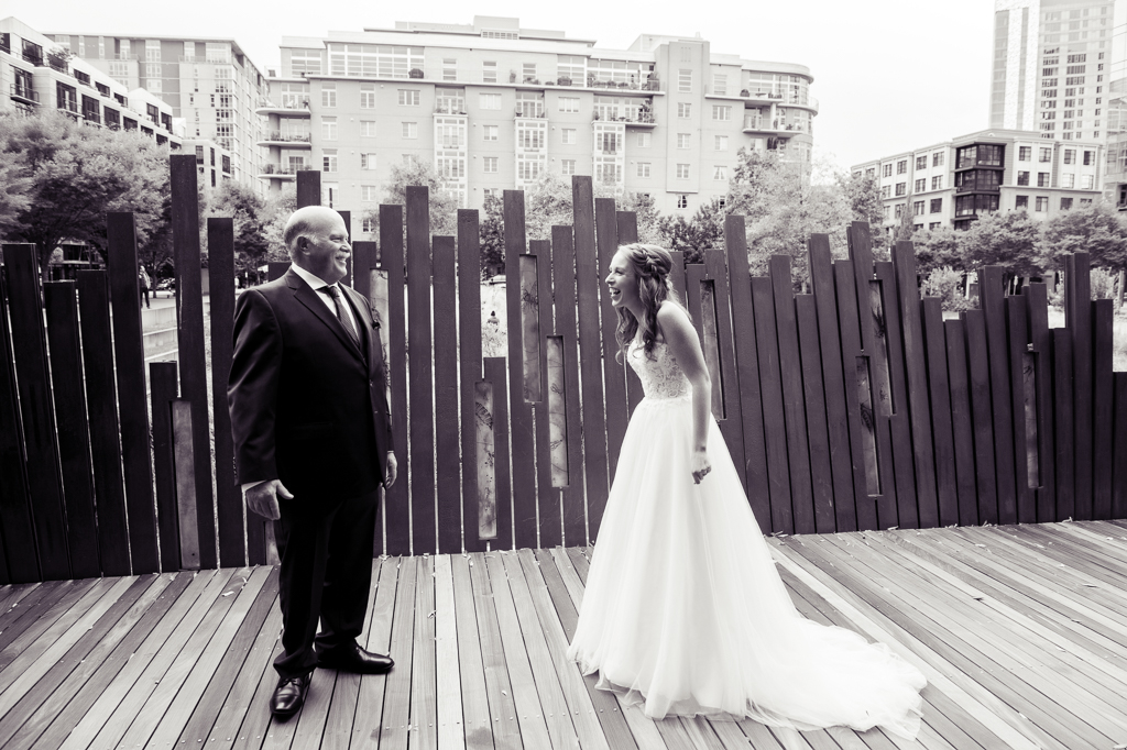bride sees her father for the first time in her wedding dress